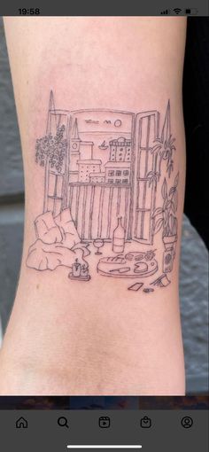 a tattoo on the side of a woman's leg