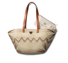 Our large tote palm bag is ideal for days out or vacation at the beach. crafted by our artisans in mexico with leather accents.  detachable lining inside and a cosmetic pouch.    you could wear our neutral isabella with any outfit. take a look at our matching hat. Bohemian Sand Travel Bags, Natural Beach Bag With Removable Pouch For Travel, Artisan Beige Travel Bag, Artisan Summer Travel Bag, Artisan Tote Shoulder Bag For Vacation, Artisan Beige Straw Bag For Travel, Artisan Shoulder Tote Bag For Vacation, Artisan Shoulder Bag For Summer, Artisan Natural Beach Bag For Travel