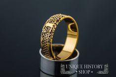 This ring is the unique and original design of Unique History Shop brand. Can't be found in any other Etsy stores! This is a unique handmade ring Metal: 14K gold (18K for custom orders) Weight: 5-7 g (depends on size) Great Details Made-to-order We can make it in any size you need! (check options) Dear customer, if you have any questions - don't hesitate to contat me! :) We can make custom engraving to this ring for you! Just add this listing to your order and a note with what do you need to be Symbolic Wedding Jewelry With Intricate Design, Yellow Gold Rings With Unique Design For Wedding, Luxury Wedding Ring With Unique Design, Luxury Jewelry With Unique Design For Wedding, Unique Yellow Gold Jewelry For Wedding, Symbolic Hallmarked Wedding Rings, Symbolic Wedding Rings Hallmarked, Gold Etched Rings For Wedding, Handmade Elegant Couple Rings For Gifts