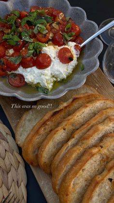 there is a plate with bread and salad on it, along with other food items