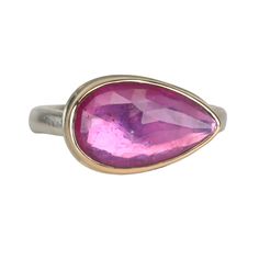 East-West Teardrop Faceted African Ruby Ring in 14 Karat Yellow Gold Bezel with Sterling Silver Backing & Middle Organic Band. Stone measures 9/16" by 5/8". Ring size 7. Pink Teardrop Fine Jewelry Ring, Pink Pear-shaped Gemstone Rings, Classic Teardrop Gemstone Rings, Fine Jewelry Gemstone Drop Rings, Teardrop White Gold Rings With Rose Cut Diamonds, Yellow Gold Teardrop Sapphire Ring, Teardrop Gemstones In Fine Jewelry Style, Classic Teardrop Bezel Set Ring, Classic Teardrop Ring With Polished Finish