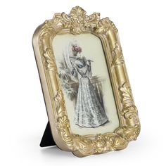 an old fashion picture frame with a woman in a dress