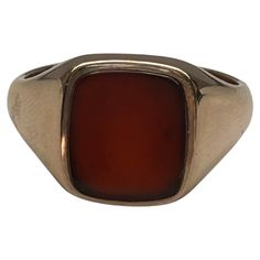 This 9ct yellow gold cornelian ring is suitable for both men and women. Hallmarked 1964, this ring comes in US size 9 1/2 and UK size T. A true statement piece. Cornelian Ring, Silver Jews, Signet Ring, Statement Pieces, Jewelry Rings, H&m, Ring Size, Yellow Gold, Men And Women