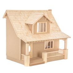 a wooden dollhouse with a porch and balcony