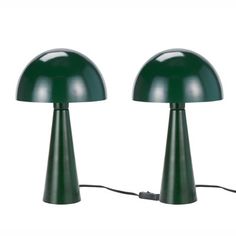 two green lamps sitting next to each other