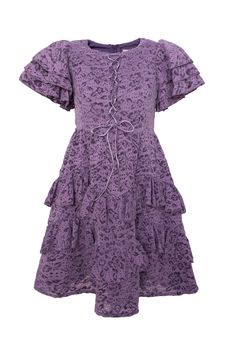 Looking for a modest girl's dress for your next big event? Allow us to introduce you to our Mini Solana Dress! Made from a vibrant purple lace burnout fabric, this dress features a square neckline and short flutter sleeves. The midi-length ruffle tiered skirt adds a touch of playfulness and includes functional pockets, while the hidden back zipper and front corset create a perfect, stylish fit. Spring Lace Dress With Square Neck And Ruffles, Spring Lace Dress With Ruffles And Square Neck, Purple Tiered Ruffle Hem Dress, Purple Tiered Dress With Ruffle Hem, Purple Lace Dress With Ruffles, Purple Lace Dresses With Ruffles, Purple Fitted Dress With Flutter Sleeves, Fitted Purple Dress With Flutter Sleeves, Fitted Purple Dresses With Flutter Sleeves