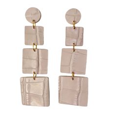 Handmade ivory alligator leather earrings featuring three tiered squares of varying sizes, elegantly dangling to provide a sophisticated yet lightweight accessory suitable for all-day wear. Upcycled Leather, Leather Tag, Leather Gifts, Leather Pieces, Custom Leather, Leather Earrings, Handmade Leather, Leather Accessories, Embossed Leather