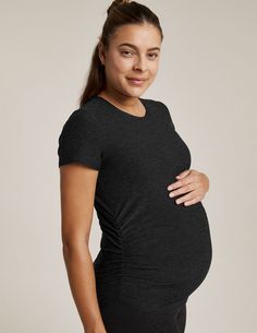 Black Stretch Tops Bump Friendly, Casual Black Bump Friendly Tops, Maternity Relaxed Fit Crew Neck Top, Fitted Gray T-shirt For Loungewear, Black Short Sleeve Bump Friendly Top, Bump Friendly Cotton Crew Neck Top, Cotton Crew Neck Bump Friendly Tops, Early Pregnancy, Usa Shorts