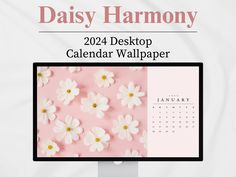 a desktop computer screen with white flowers on it and the words daisy harmony next to it