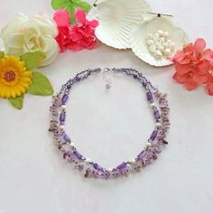 "Double Strands Short Amethyst in Different Shapes, and Freshwater Pearls Necklace. Necklace Length: 17.5 \" L;  Extender: 1.5\" L. Material: 4-6mm purple Crystals, 6mm round-shaped genuine amethyst, 11mm barrel-shaped amethyst, 7-8mm potato-shaped Freshwater Pearl, and freeform amethyst. Clasp: 925 sterling silver lobster claw clasp and extender. Workmanship:  Each bead is hand-beaded. https://www.etsy.com/shop/MYGEMSROCK" Lavender Amethyst Necklace With Stones, Amethyst Crystal Necklaces With Gemstone Accents For Jewelry Making, Purple Amethyst Necklace With Gemstone Accents, Purple Crystal Necklaces With Gemstone Accents For Jewelry Making, Purple Crystal Necklaces With Gemstone Accents, Purple Crystal Necklace For Jewelry Making, Purple Amethyst Necklace With Natural Stones, Lavender Amethyst Necklaces For Jewelry Making, Amethyst Necklace With Natural Stones For Jewelry Making