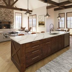 a large kitchen with an island in the middle and lots of windows on both sides