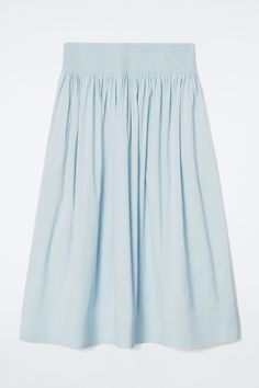 Voluminous silhouettes animate the COS womenswear collection this season. Crafted from an airy cotton blend, this sky-blue skirt is artfully smocked at the waistband and cut in an A-line midi shape. Regular fitElasticated waistband Shell: 75% Cotton, 22% Polyamide, 3% Elastane. Excluding trims / Machine wash Back length of size 6 is 30.39" / Model wears a size 6 Belted Cape, Women Magazines, Blue Skirt, Denim Coat, Denim Outfit, Trouser Jeans, Hat Hairstyles, Playsuit Jumpsuit, Jacket Dress