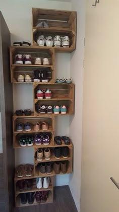 there are many pairs of shoes on the shelves