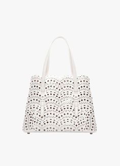 Shop the Alaïa Optic White MINA 25 TOTE BAG for women. Shop the US store online now and receive free standard shipping. Elegant Satchel With Dust Bag For Errands, Alaia Mina, Alaia Bag, Spring Staples, White Tote Bag, White Tote, Bags Aesthetic, Press Studs, Bergdorf Goodman