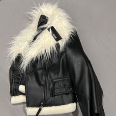 This Jacket Is Super Cute!! It’s Brand New Never Worn. If You Have Any Questions Feel Free To Ask. Edgy Winter Cropped Jacket With Zipper Closure, Black Biker Jacket For Spring, Black Edgy Outerwear With Faux Fur Trim, Trendy Winter Biker Jacket For Cold Weather, Edgy Long Sleeve Cropped Jacket For Winter, Chic Winter Biker Jacket For Cold Weather, Edgy Winter Outerwear With Faux Fur Trim, Edgy Outerwear For Cold Weather And Winter, Edgy Winter Outerwear For Cold Weather