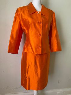 "Amazing rare vintage LANVIN silk blazer & skirt set in mandarin orange silk taffeta. Highest quality that you expect from this couture label. Love the shorter length of the jacket for a cropped look - skirt would be awesome hemmed to a mini length, easy alteration. Functional breast pockets on jacket, but have not been opened. Both pieces fully lined in silk. No wear noted. Stunning worn separately or together!  Made by LANVIN Paris  Marked size 44 - modern size medium to large.  Measurements ( Elegant Fitted Orange Suit, Orange Suits For Spring Formal Events, Fitted Orange Workwear Sets, Elegant Orange Silk Sets, Spring Evening Silk Skirt Suit, Spring Silk Skirt Suit For Evening, Silk Skirt Suit For Spring Evening, Elegant Orange Party Sets, Tailored Silk Evening Sets