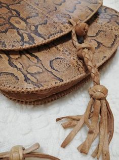 Beautiful artisan handmade snakeskin purse bag, Adjustable strap Size 25*24*10 cm Approx 9.5*9.4*4 inches Very good condition Vintage Saddle Bag, Messanger Bag, Snakeskin Purse, Purse Handmade, Handbag Leather, Brown Handbag, Vintage Bag, Handmade Bag, Tooled Leather