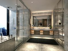 a bathroom with a large walk in shower next to a bathtub and sink area