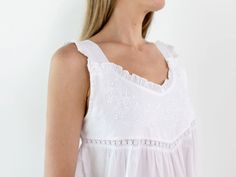 Preorder only is available. This new nightgown will ship in November 2023. Introducing the Cecily Nightgown, a beautiful style featuring delicate ruffle trim along the neckline and white floral embroidery on the bodice. The cutout lace along the front exudes a sense of allure, making it a very special piece. Similar to the Theresa, this style falls below the knee, to keep your legs warm and a versatile style for any season of the year. Sizes:   EL375-S             Small (US 2-4) EL375-M White Ruffled Dress For Home, Summer Delicate Lace Nightgown For Bedtime, Summer Nightgown With Delicate Lace For Bedtime, Summer Delicate Lace Nightgown, Summer Delicate Lace Nightgown For Loungewear, Summer Nightgown With Delicate Lace For Loungewear, Summer Sleeveless Delicate Lace Nightgown, Summer Sleeveless Nightgown With Delicate Lace, Sleeveless Delicate Lace Summer Nightgown