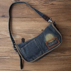 Overview： Design: Vintage Womens Denim Mini Pouch with Wristlet Denim Small Phone Purse for Women In Stock: Ready to Ship (2-4 days)Include: Only BagCustom: NoColor: Dark Blue, BlackLeather:, JeanMeasures: 16cm x 10cm x 5.5cmWeight: 0.1kgSlots: 1 main slot, 1 inside pocket,Accessories(option): NoneStyle: Vintage Womens Denim Mini Pouch with Wristlet Denim Small Phone Purse for WomenVery durable (At least 5 Years) and it should last a life time Note： Each item will have very slight variances to t Small Denim Bag, Denim Purse Diy, Denim Baguette Bag, Denim Pouch, Main Slot, Overview Design, Small Phone, Jean Purse, Denim Bags