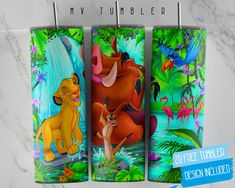 the lion king and the jungle bookmarks are hanging from hooks on a marble wall