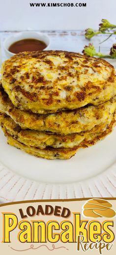 some pancakes are stacked on a white plate