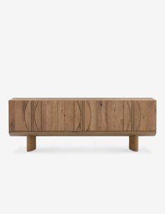 the sideboard is made out of wood and has wavy lines on it's sides