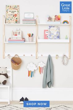 a child's room with bookshelves and toys