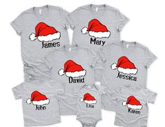 Santa hat shirts, Chirstmas Santa 2024 shirts, Santa Claus Name shirts, Custom Family Christmas Name shirt, Family Matching Christmas Shirts, Family Christmas Shirt, Matching Christmas Tee, Custom Christmas Name Tee, Xmas Name Shirt,  🎁 This shirt is perfect for Family Christmas photos or matching pajamas! You'll adore its soft and cozy feel. Note: The pants are not included; this listing is for the shirt only. * High quality and super soft, comfortable shirt. Made with top-of-the-line vinyl an Customizable White Tops For Holiday, Customizable Cotton Christmas T-shirt, Customizable Short Sleeve Christmas Tops, Customizable White Christmas Tops, Casual Customizable Christmas Tops, Casual Christmas Tops With Customizable Details, Casual Customizable Tops For Christmas, Customizable Christmas Gift Tops, Customizable Cotton Tops For Holidays