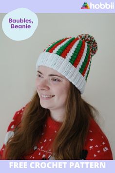 a woman wearing a red and white knitted hat