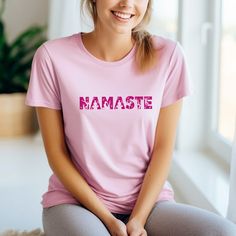 "Namaste t-shirt for women, Yoga shirt gift for girlfriend, Yoga tshirt for bestfriend, Namaste spiritual shirt, Meditation shirt for yoga lover This t-shirt says Namaste, the greeting of peace and harmony. It's a great way to express your passion for yoga and meditation. Or as a thoughtful gift for any yoga lover in your life. \" An extraordinarily imaginative print, the shirt was delivered very quickly and the recipient is totally happy with it. Thanks very much! \" 💛 M. If you like this design, check out all our other cool designs here: https://etsy.me/3QcjoYW Love tote bags? Find them here: https://etsy.me/3H8CwUI Size: For accurate fit we recommend measuring one of your own t-shirts and comparing sizes with our size guide in the listing photos above. S M L XL 1XL 2XL 3XL This is a ma Spring Casual Yoga T-shirt, Yoga Style Outfits, Crew Neck T-shirt For Yoga, Cheap Relaxed Fit Yoga T-shirt, Spiritual Shirts, Breathable Yoga T-shirt In Solid Color, Yoga Shirt, Yoga And Meditation, Namaste Yoga