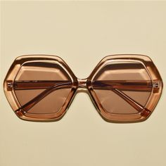 These 1970s vintage style sunglasses feature an oversized hexagon lens, provide UV400 protection and comes in three colors. Each sold separately. Dimensions: Length: 6 inches Lens diameter: 2 3/8 inches Cute Hippie Sunglasses, Cheap Vintage Plastic Sunglasses, Retro Jewelry Popular In The 1970s, 70s Glasses Sunglasses, Tawny Autumn, Sunglasses 70s, 1970s Sunglasses, 70s Accessories, Bachelorette Sunglasses