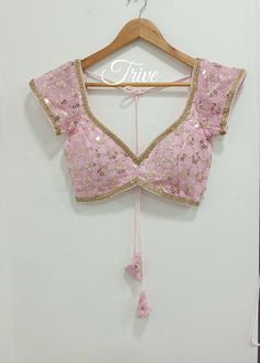 This Made to Order/Made to Measurement/Custom Made Indian Ethnic Blouse. - Fabric - Mirror Work Georgette - Color - Pink  - Princess Cut - Rich Lined - Sleeveless - Extra margin and extra stitches included in the blouse - It can be customize in any color, design or size  MEAUREMENTS & CUSTOMIZATIONS This blouse can be purchased in your standard sizing and pattern. Please choose your Chest Size (measured in inches) from the drop-down box.. For custom sizing please include the below measurements in the the notes to whenever you placed the order. * Chest size: * Waist size: * Blouse Length: * Bicep: * Arm-hole: * Sleeve Length: * Front Neck Depth: * Back-Neck Depth:  Sleaves Around PLEASE NOTE: BUYERS ARE RESPONSIBLE FOR ANY CUSTOMS AND IMPORT TAXES THAT MAY APPLY. This is a made to order pro Lehenga Blouse Designs Front Neck, Front Deep Neck Blouse, Corset Style Blouse, Short Sleeve Lehenga Blouse, Cut Sleeve Blouse Design, Dark Pink Blouse Designs For Saree, Sleeveless Back Blouse Designs, Blouse Designs Princess Cut, Traditional Fitted Blouse With Gota Work