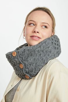 Stay wrapped up this winter with the Kilmaine Aran Snood Scarf, a luxurious double wrap accessory that exudes timeless elegance. 

Handcrafted using 100% Merino wool, this snood showcases intricate panels of honeycomb stitch, elongated and regular rope cables, and trellis cables with hugs and kisses stitch along the edges. 

Chic, warm, and versatile, the Kilmaine Aran Snood Scarf is a must-have accessory that effortlessly blends traditional craftsmanship with modern style. Elevate your fashion Fisherman Rib Scarf, Winter Cable Knit Scarves, One-size Knit Infinity Scarf, Button Scarf, Cable Scarf, Honeycomb Stitch, Snood Scarf, Hugs And Kisses, Yarn Shop