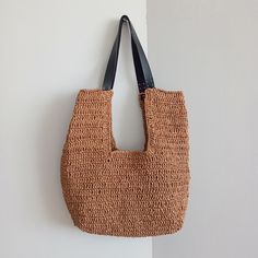 Looking for the perfect beach bag to complement your style at the seaside, by the pool, or on your summer vacations? This handmade beach bag, woven from raffia yarn and paper yarn, is just what you need! This special bag is meticulously crafted with natural materials, offering both durability and elegance. With its spacious interior, you can comfortably carry your beach towel, sunscreen, book, and other essentials. Features: Material: Raffia Yarn and Paper Yarn Color Options: beige. brown. light Beachy Crochet Jute Bag For Vacation, Beachy Crochet Jute Bag For Beach, Beachy Crochet Bag Made Of Jute For Vacation, Beachy Jute Crochet Bag For Beach, Beach Style Crochet Jute Bag, Beach-style Crochet Jute Bag, Beach Season Crochet Jute Bag, Beachy Crochet Bag With Natural Fiber For Beach, Beachy Crochet Bag For Beach