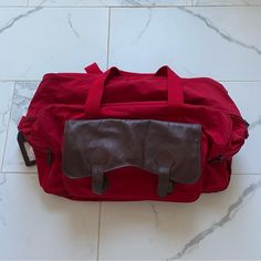 Original 90s Marlboro Bag Good Condition, Few Small Flaws Shown Has Original Luggage Tag Unused Casual Red Canvas School Bag, Red Large Capacity Canvas Bag For Travel, Red Canvas Shoulder Bag With Pockets, Casual Red Bags For Weekend, Casual Red Bags For The Weekend, Casual Red Bag For Weekend, Casual Red Weekend Bag, Red Canvas Satchel With Large Capacity, Red Canvas Shoulder Bag For School