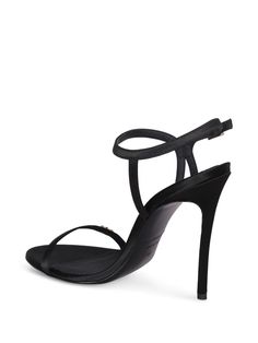 High stiletto heel sandals with crisscross straps and decorative golden buckle.. Express elegance and sophistication with Dsquared2's Double D Black Mules. This enticing model features a sleek silhouette with golden buckle details adding a touch of luxury.Gender: WomenMaterial: 100% SATIN 100% CALF LEATHERColor: BlackMade in: ImportedProduct ID: HSW0250 00100001 2124*Import tax/duty will be calculated at checkout (If applicable) Luxury Strappy Sandals With Buckle Closure, Sleek Evening Heels With Buckle Closure, Chic Evening Sandals With Single Strap, Chic Single Strap Sandals For Evening, Chic Single Strap Evening Sandals, Luxury Single Strap Sandals For Evening, Elegant Black Single Strap Sandals, Luxury Single Strap Sandals For Formal Events, Luxury Single Strap Formal Sandals