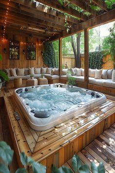 Enclosed hot tub in a garden setting with dense greenery and privacy fencing. Garden Hot Tub, Mobile Home Back Porch Ideas, Mobile Home Back Porch