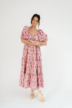 our beloved zoco daymaker dress with a cute new rosey vibe. featuring a vintage-inspired pink rose pattern, it’s a must-have for garden parties, bridal showers, + anything that calls for florals. pink floral // maxi length, puff sleeve, tiered skirt, elastic scoop neckline, pockets model is 5'8" + wearing a small measurements are approximate + taken while laying flat xsmall : bust 34" length 50" small : bust 36” length 50” medium : bust 38” length 50.5” large : bust 40" length 51" xlarge : bust Secret Dress, Garden Parties, Tier Skirt, Tiered Skirt, Large Bust, Rose Pattern, Bridal Showers, Floral Maxi, Small Bust