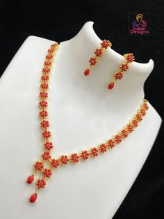 American Diamond Multicolor Gemstone Necklace Set, a luxurious addition to any formal or celebratory attire. Intricately crafted with the lustrous sparkle of American diamonds and a symphony of colored stones resembling ruby, emerald, and sapphire hues, this necklace exudes royalty. Accented with red coral and timeless pearls, the set includes a pair of matching earrings that gracefully complement the necklace. Whether for a wedding, gala, or special cultural event, this necklace set is sure to make a statement and cherish your moments. Coral Necklace Indian Gold, Trendy Ornaments, Ruby Necklace Designs, Pearl Locket, Coral Jewellery, Red Stone Necklace, Coral Jewelry Set, Bridal Jewelry Sets Brides, Necklace Set With Earrings