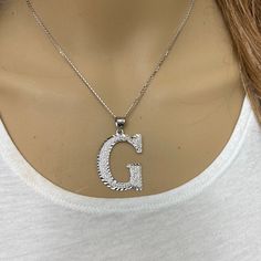 925 Sterling Silver Diamond Cut Initial Large Letter G Pendant Necklace Metal: 925 Sterling Silver Pendant: Large Height: 1.8" (45.7 Mm) Width: 1.1" (28 Mm) Rolo Chain In 16", 18", 20", 22" Brand New With Box Available In Any Letter From A-Z Pendant Can Be Available In Small Or Medium Size In Different Listings, Available In 10k, 14k, Or Sterling Silver Made To Order. Might Take 3-5 Days To Be Shipped. Letter J Pendant Necklace Is For Size Demo. Available In Another Listing. Silver Pendant Initial Necklace In Fine Jewelry, Silver Initial Pendant Clavicle Chain Necklace, Silver Initial Necklace With Round Shape, Silver Sterling Silver Initial Necklace, Silver Initial Pendant Necklace Fine Jewelry, Silver Round Initial Clavicle Necklace, Silver Cubic Zirconia Initial Necklace For Gift, Silver Fine Jewelry Necklace With Initial Pendant, Personalized Silver Initial Necklace With Cubic Zirconia