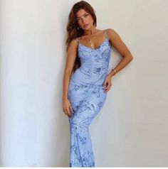 Step into Summer with style in the Inessa Floral Maxi Dress! This French-inspired dress features a figure-hugging bodycon fit, romantic floral print, and lace detailing that'll have everyone doing a double take! With an attractive blue color and a V-neckline, you'll look ravishing in this Good Girl Things - Summer's in Bloom Collection piece. Who says elegance can't be fun?! Inessa Floral Maxi Dress in Blue Romantic Elegant French Style Figure Hughing Bodycon Fit Attractive Colors V-Neck Lace De Light Blue Fitted Maxi Dress With Spaghetti Straps, Stretch Blue Maxi Dress With Floral Print, Fitted Floral Print Bodycon Evening Dress, Blue Maxi Dress With Sweetheart Neckline For Spring, Blue Floral Print Dress With Sweetheart Neckline, Fitted Blue Floral Print Maxi Dress, Fitted Blue Maxi Dress With Floral Print, Fitted Blue Maxi Dress With Sweetheart Neckline, Blue Bodycon Dress With Sweetheart Neckline