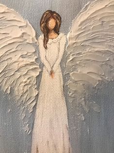 an angel painted on canvas with white paint