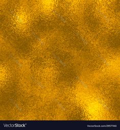 an abstract gold background with lots of small circles on the top and bottom, as well as