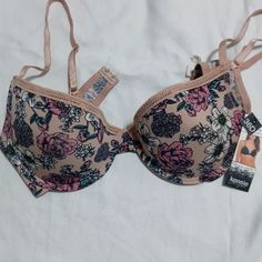 This Is A Kensie Lingerie Bra Size 36d Brand New With Tags. It's In A Nice Nude Background With Beautiful Pink And White Flowers And Purple With Some Greenery It's Brand New It's Got That The Easy Glide Adjustable Straps And It Has No Extra Padding Just A Really Nice Brand New Bra. Nude Background, Front Clasp Bra, Purple Bras, Floral Bra, Strappy Bra, Soft Cup Bra, New Bra, Pink And White Flowers, Retro Women