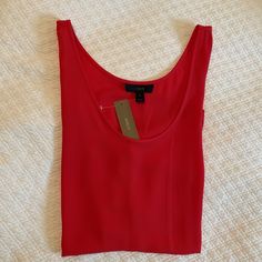 Nwt J.Crew Sleeveless Tank In Firecracker Red. Brand New, Never Worn With Original Tags Attached. Women’s Size 8. Rounded Hem. Scoop Neckline. Approximate Measurements: 25-Inches Long From Shoulder To Hem, 20.5-Inches Wide Across Armpit To Armpit. Looks Cute Tucked In With White Wide-Leg Denim, Or Worn With A Suit For Dressier Events! Fitted Red Tank Top With Scoop Neck, Red Fitted Scoop Neck Tank Top, Casual Red Sleeveless Tank Top, Red Sleeveless Blouse For Party, Red Sleeveless Tank Top For Spring, Red Scoop Neck Tank Top For Summer, Red Scoop Neck Tank Top, Red Scoop Neck Casual Tank Top, Sparkly Tank Top