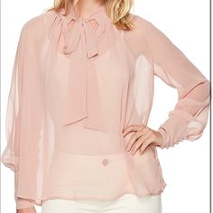 Look Chic And Effortless In This Misty Rose Colored Shirt Crafted From A Sheer Fabric, The Bow Tie Shirt Features A High Neck With Tie Up Bow And Gathered Seam, Plunging Front Cut Out, Long Sleeves With Fused Button Up Cuffs And Relaxed Silhouette Elevate The Look With A Tailored Pant And Strappy Heel 98% Polyester, 2% Elastane Imported Dry Clean Only Color: Dusty Rose Final Sale Price Currently On Amazon For $55 Elegant Pink Tops For Brunch, Pink Fitted Tie Neck Top, Elegant Pink Tie Neck Top, Pink Tie Neck Top For Party, Feminine Pink Tie Neck Top, Pink Feminine Tie Neck Top, Neck Bow Tie, Bow Tie Shirt, Floral Lace Shorts