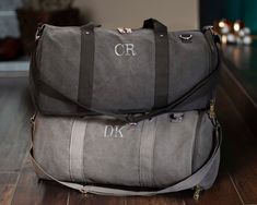 "This personalized washed canvas duffel bag is the perfect corporate gift! Made with heavyweight cotton canvas, these bags are both practical and durable. The interior contains two pockets for additional organization is fully polyester lined. Additional features include a detachable strap, and one outside pocket, and an outside zippered shoe compartment, so you can keep your shoes separate from your clothing. Personalize them to create a special, unique gift! Bag dimensions: 20\" length, 10.5\" Large Capacity Cotton Rectangular Duffle Bag, Personalized Cotton Canvas Bag For Travel, Personalized Cotton Canvas Travel Bag, Personalized Rectangular Canvas Bag, Customizable Cotton Canvas Bag For Travel, Customizable Canvas Bags For Personalized Gift, Personalized Canvas Bags For Gifts, Personalized Gift Canvas Bag, Personalized Beach Tote