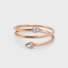 Wrap yourself up in a solid gold ring featuring two natural diamonds. Ring Redesign, Redesign Ideas, Solid Gold Ring, Wrap Ring, Solid Gold Rings, Pear Diamond, Wrap Rings, Pear Shaped, Gold Ring