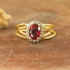 Red rose ruby ring for women, 925 Sterling silver ring, Minimalist ring for her, AAA Ruby ring, Natural Ruby ring, Wedding ring, Statement ring, Gold ring.  *Other Similar Jewelry Available Here* https://www.etsy.com/shop/AreebaJewelry Details:- Gemstone - Red Stone Color Available - Natural Red Stone Setting - Prong Quality - AAA Grade Stone Size - 5 x 7 MM Ring Size - 5 US TO 9 US Available Type - 100% Natural  Shipping service - Free worldwide shipping service About AreebaJewelry:- AreebaJewelry takes great pride in the design and craftsmanship of our fine jewelry pieces. We use only the finest materials and the highest manufacturing standards. We strive to make sure every jewelry piece we design is perfect. ♥️ More Matching collections are available to purchase HERE: - https://www.etsy Ruby Halo Jewelry For Promise Ring, Ruby Halo Promise Ring Jewelry, Fine Jewelry Ruby Ring With Halo For Gift, Ruby Ring With Halo For Gift, Ruby Ring With Halo Detail As A Gift, Ruby Halo Cluster Ring Gift, Ruby Halo Ring As A Gift, Ruby Open Ring, Ruby Halo Ring For Promise Occasion